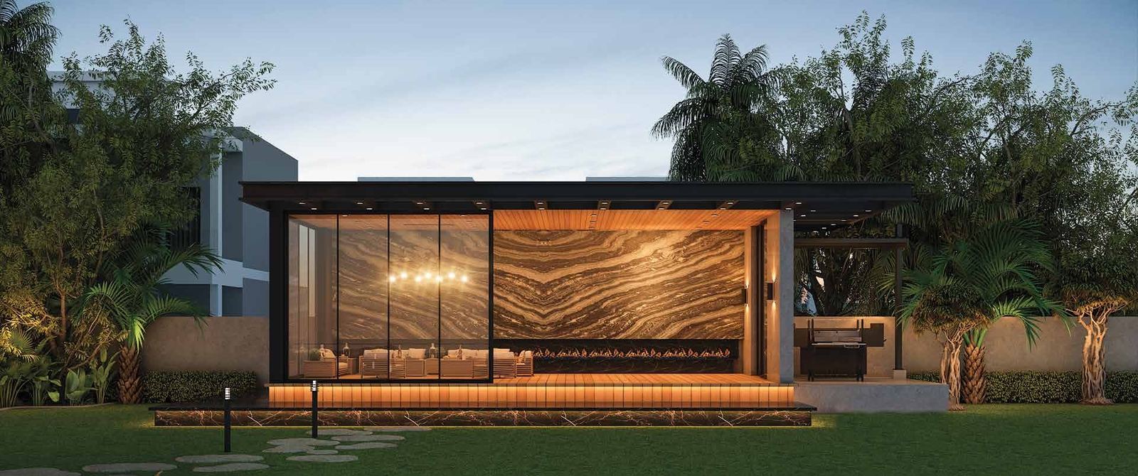 Garden pavilion at dusk, book-matched stone wall lit from within